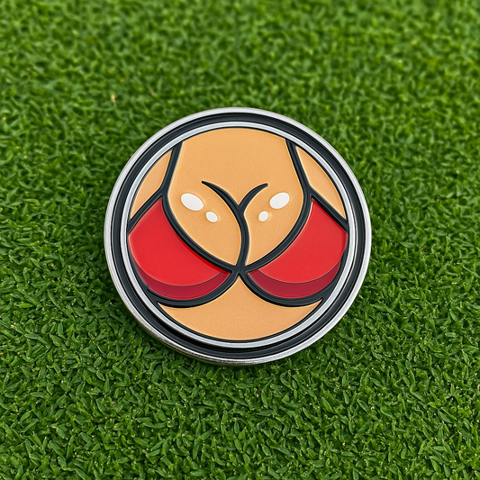 Circular object with a design on a green grass background